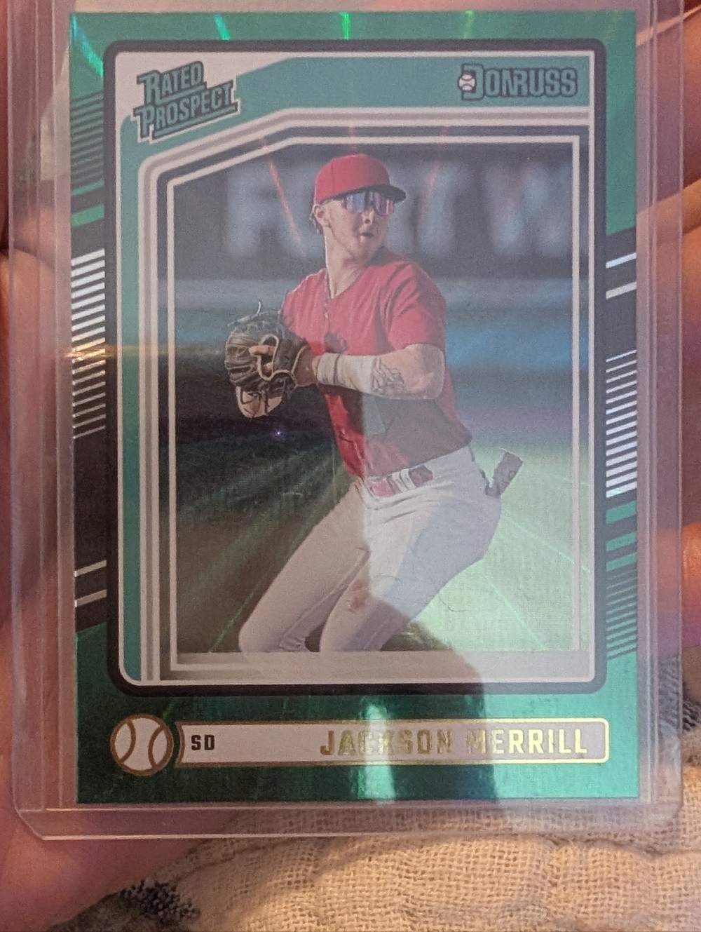 JACKSON MERRILL '24 Panini Donruss - Rated Prospects Green Laser #102 (RC)